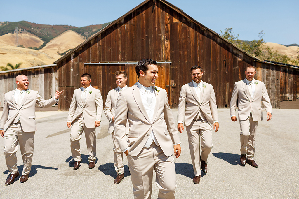 Groom and his groomsmen in walking at Higuera Ranch in San Luis Obispo, CA