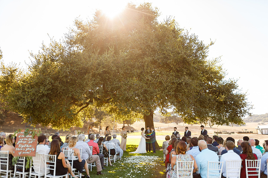 Wedding ceremony under oak tree at Thousand Hills Ranch,