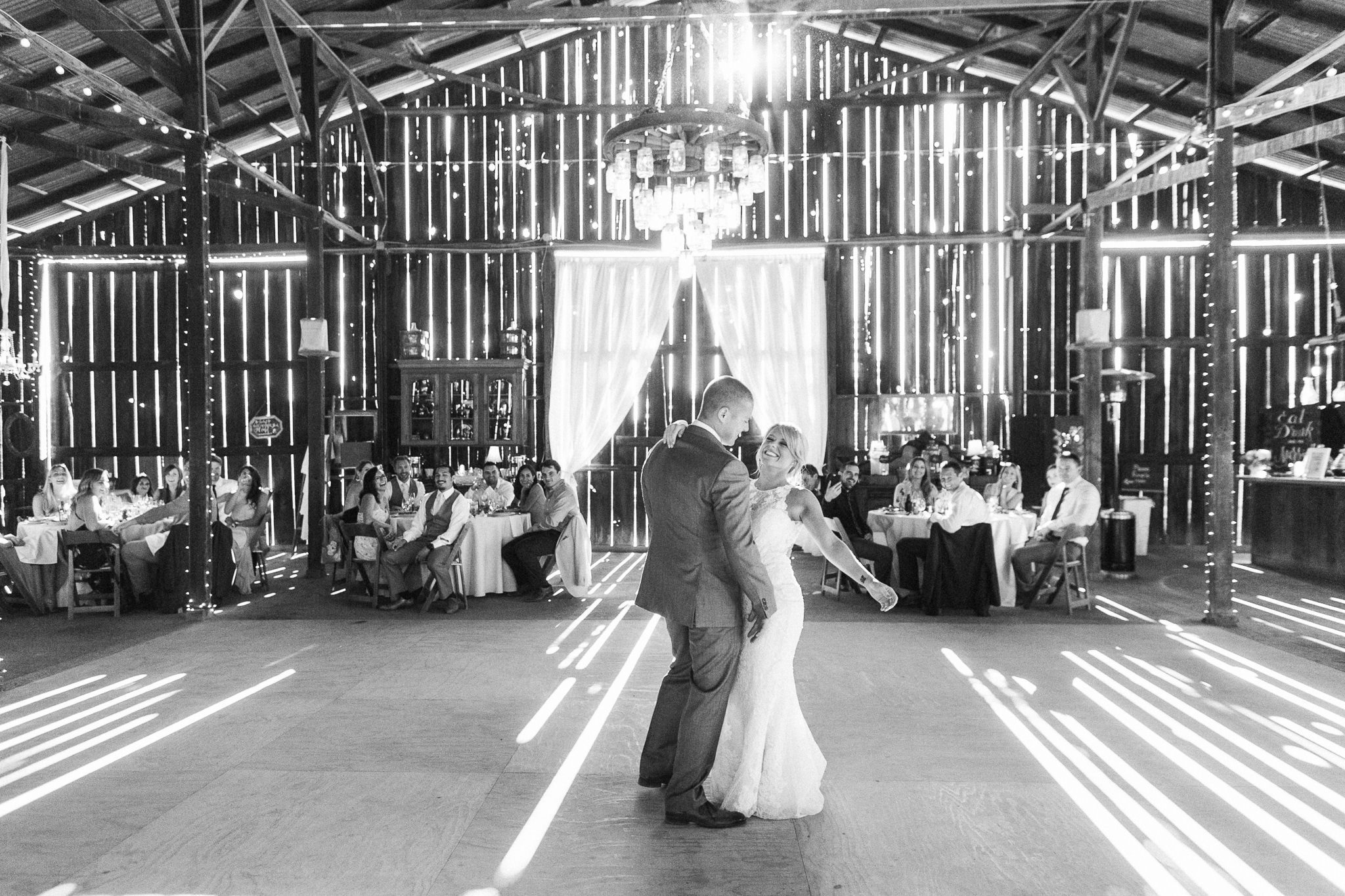 Bride and groom share their first dance at Dana Powers Barn wedding