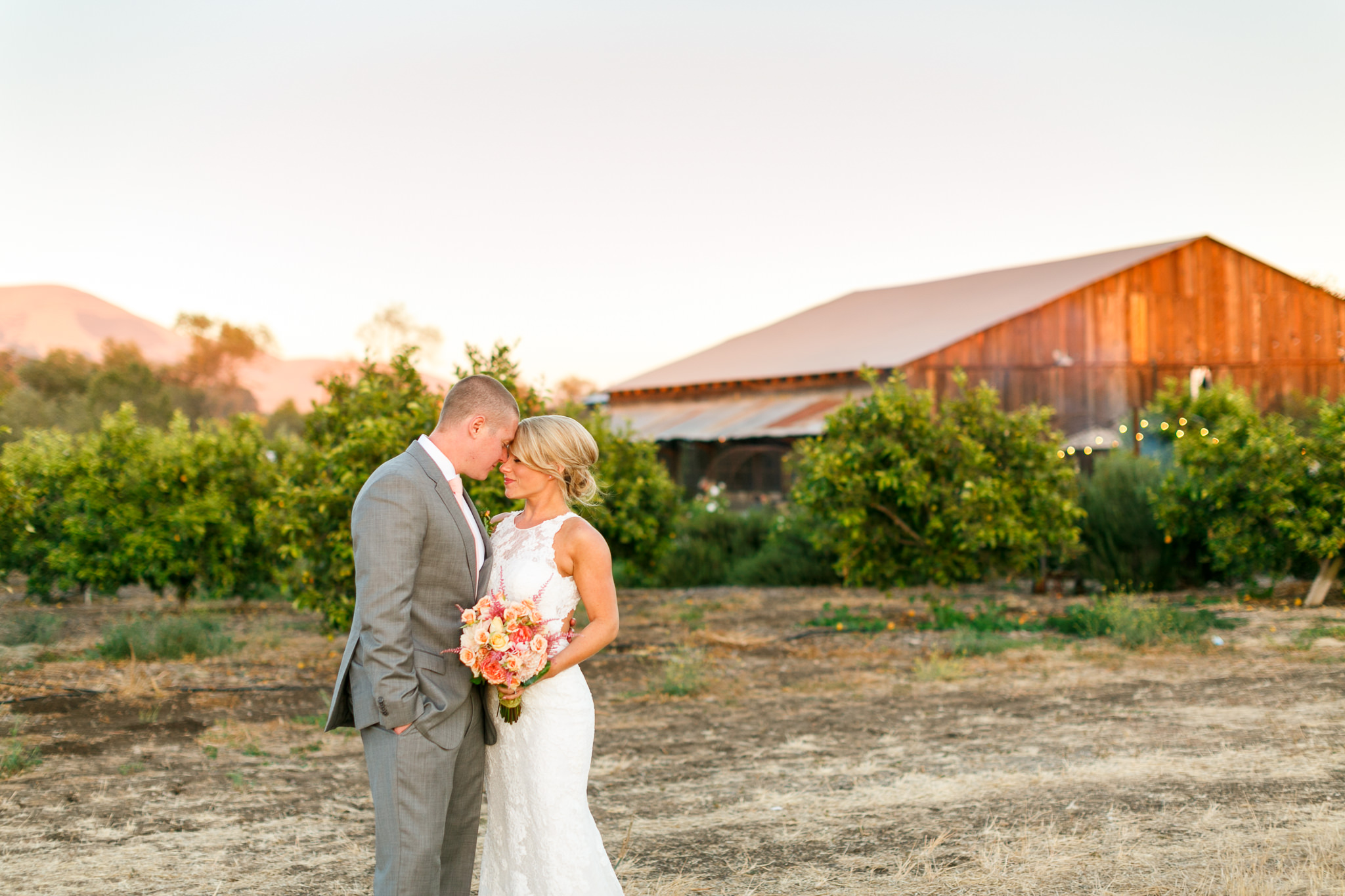Bride and groom together at sunset after their wedding at Dana Powers Barn