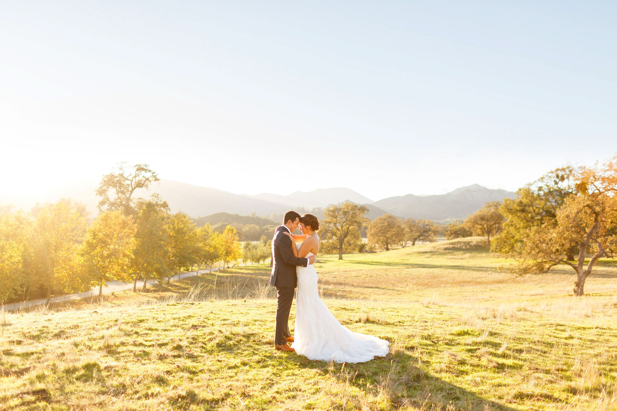 Bride and groom portraits during sunset after wedding at Spanish Oaks Ranch